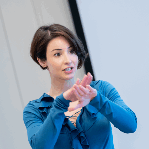 A Body Talk coach demonstrating public speaking skills