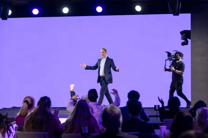 Projecting confidence through holding arms out to the side