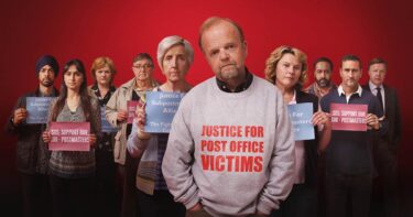 A promotional image from the ITV series 'Mr Bates vs the Post Office' showing a number of sub-postmasters with the words 'Justice for Post Office Victims'.